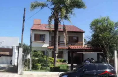 Casa com 4 quartos à venda na rua landel de moura, 2739, tristeza, porto alegre por r$ 1.600.000