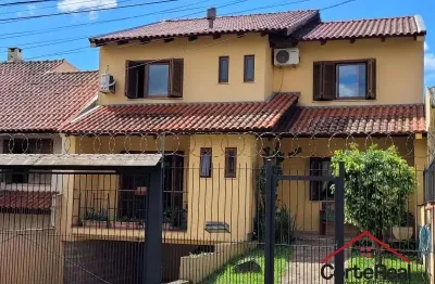Casa com 3 quartos à venda na rua doutor mário totta, 2812, tristeza, porto alegre por r$ 870.000