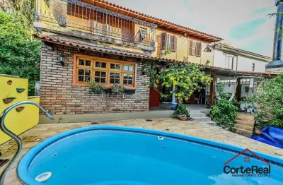 Casa com 4 quartos à venda na das figueiras, 108, santa tereza, porto alegre por r$ 650.000
