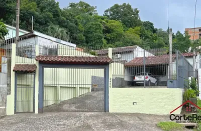 Casa com 3 quartos à venda na avenida vicente monteggia, 2406, vila nova, porto alegre por r$ 495.000
