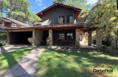 Casa em condomínio fechado com 4 quartos à venda na central, 1500, atlântida, xangri-lá por r$ 1.900.000