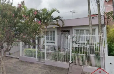 Casa com 3 quartos à venda na wolfrid, 65, petrópolis, porto alegre por r$ 699.000