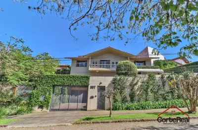 Casa com 4 quartos à venda na rua felipe becker, 357, três figueiras, porto alegre por r$ 2.870.000