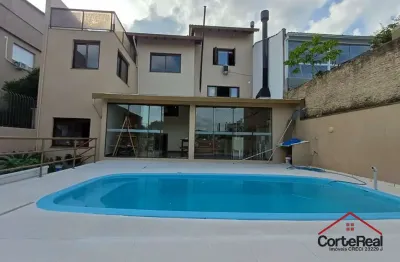 Casa com 3 quartos à venda na Rua Professor Abílio Azambuja, 43, Jardim do Salso, Porto Alegre por R$ 1.299.000