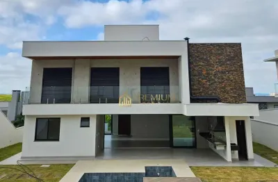Sobrado com 4 dormitórios à venda, 450 m² por r$ 4.500.000,00 - condomínio reserva do paratehy - são josé dos campos/sp
