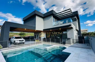 Sobrado com 5 dormitórios à venda, 420 m² por r$ 4.300.000,00 - condomínio residencial colinas do paratehy - são josé dos campos/sp