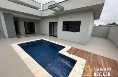 Casa térrea com 3 quartos, 2 suítes e piscina no condomínio terras do vale