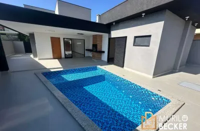 Casa á venda no condomínio floradas da paratehy, bairro urbanova