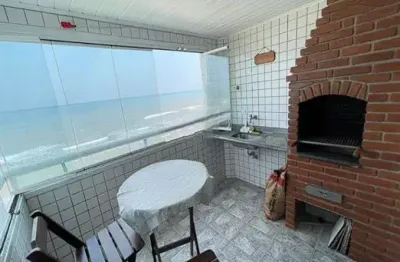 Apartamento frente mar | varanda com churrasqueira á carvão