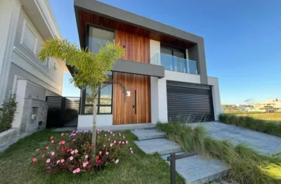 Casa de alto padrão com 3 suítes e piscina no bairro pedra branca – palhoça - mrt