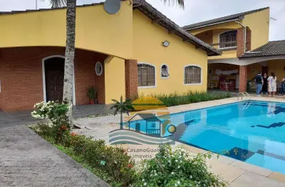 Casa com 4 suítes piscina churrasqueira 6 vagas na praia suarão - itanhaém