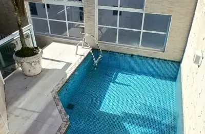 Cobertura venda 2 dormitorios 1 suite 2 vagas com piscina e churrasqueira enseada guaruja co10e