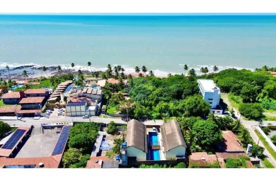 Chalé com 4 quartos sendo 3 suites beira mar em Carapibus, Conde PB.