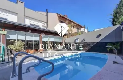 Casa em condomínio fechado com 3 quartos à venda na avenida edgar pires de castro, hípica, porto alegre por r$ 1.149.000