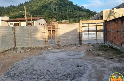 Terreno à venda na Rua Um, 22, Martim de Sá, Caraguatatuba