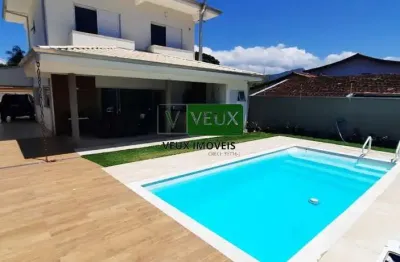 Ótimo imóvel de alto padrão a venda jardim britânia, caraguatatuba