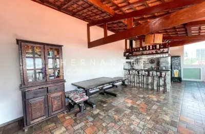 Imperdível casa à venda em Barueri-SP, Jardim Tupanci com energia solar e móveis planejados, 2 vagas, 150m²!