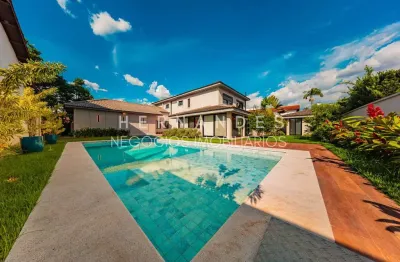 Oásis de conforto e sofisticação em alphaville: casa com 4 suítes, piscina e área verde de 400 m² - barueri-sp.