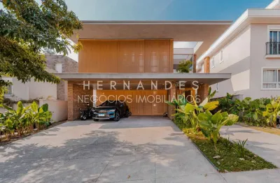 Casa de luxo à venda em tamboré - santana de parnaíba-sp  4 quartos, 4 suítes, 3 salas, 6 banheiros, 3 vagas de garagem  mobiliada e decorada  projeto exclusivo rodrigo latorre  área de 501m²  piscina