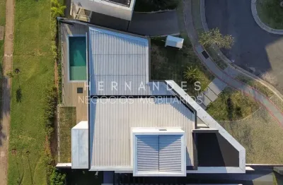 Casa em condomínio exclusivo - 4 quartos, 4 suítes, 3 salas, 4 vagas