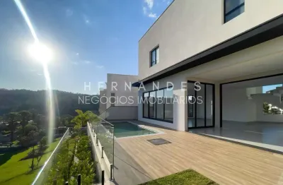 Casa em condomínio exclusivo - 4 quartos, 4 suítes, 3 salas, 4 vagas