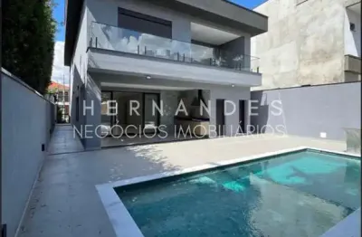 Casa de luxo em condomínio à venda em alphaville: 4 suítes, 3 salas, 4 vagas.