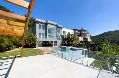 Imóvel de luxo em condomínio fechado com 4 suítes e 570m² em Santana de Parnaíba-SP, no Tamboré.