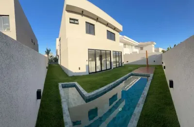 Casa em condomínio fechado com 4 quartos à venda na rua itaparica, alphaville (abrantes), camaçari, 280 m2 por r$ 1.970.000
