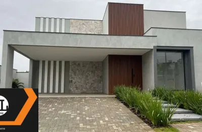 Casa à venda no condomínio alphaville esplanada 4 com uma bela piscina com borda infinita.