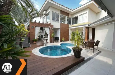 Linda casa terrea à venda no condomínio vivendas do lago com sala de estar, jantar, lavabo, jardim de inverno, escritório, cozinha, espaço gourmet.