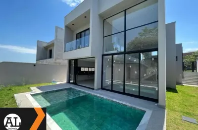 Maravilhosa casa á venda no condomínio alphaville 1, com 305m2 de área construída em um terreno de 400 m2