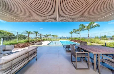 Mansão cinematográfica nova, frente mar, pronta para morar finamente mobiliada, equipada e decorada.