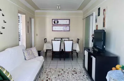 Apartamento com 02 suítes mais 01 dormitório com 01 vaga privativa e breve vista mar