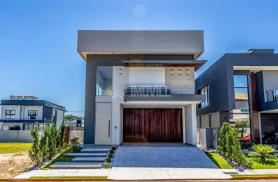 Casa nova no condomínio fechado com 04 dormitórios, 04 vagas