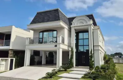 Linda casa luxuosa com 5 suítes no condomínio reserva golf camboriú