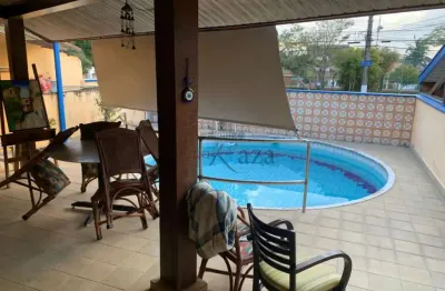 Casa em condomínio  jardim das colinas 3 dormitórios - 230m² 3 suítes com piscina e churrasqueira em frente a praçaparte alta
