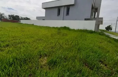 Terreno em condomínio - caçapava - condomínio bella vitá caminho da mata - 360m².