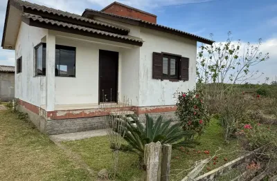 Casa em bom estado de conservação na zona sul, baln. rincão - 02 dorm, sala/cozinha, edícula com fogão a lenha