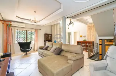 Casa com 5 quartos à venda na rua isidoro tressi, 507, jardim botânico, porto alegre, 379 m2 por r$ 1.550.000