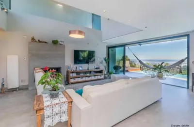 Casa em condomínio fechado com 4 quartos à venda na rua bertha loforte gonçalves, 80, vila nova, porto alegre, 500 m2 por r$ 4.890.000