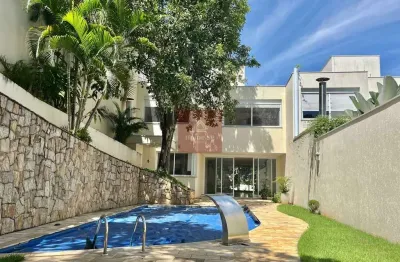 Casa em condomínio fechado brooklin - 425m² 4suites 4vagas de garagem com piscina e churrasqueira