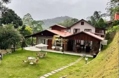 Um paraíso em meio a mata atlântica. casa de campo moderna alto padrão mobiliada com porteira fechada.