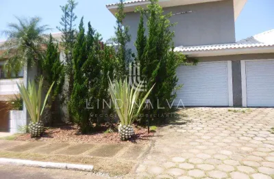 Sobrado mobiliado no condomínio crisálidas com 5 dormitórios, área gourmet e jardim.
