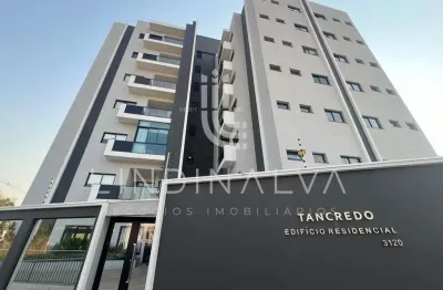 Apartamento novo no ed. tancredo, com suíte, quarto e garagem - semimobiliado