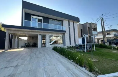 Casa em condomínio possui 489 metros quadrados com 7 quartos em jardim guacyra - itanhaém - sp