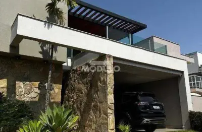 Casa de condomínio à venda, 4 quartos, 3 suítes, 2 vagas, aclimação - uberlândia/mg