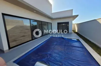 Casa de condomínio à venda, 3 quartos, 3 suítes, 4 vagas, laranjeiras - uberlândia/mg