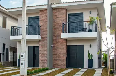 Casa nova sobrado pronta no medeiros, condomínio kaza alamedas com 2 suítes, quintal, lavabo e 2 vagas de garagem.