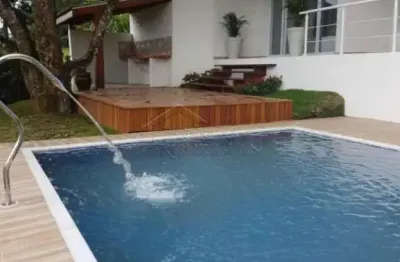 Casa espaçosa com 4 quartos, 320 m² - condomínio chácaras cataguá - taubaté/sp