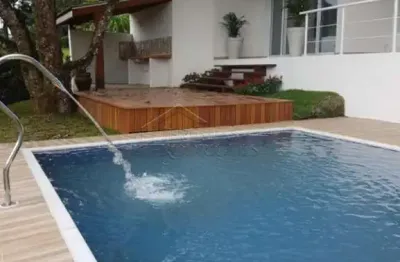 Casa espaçosa com 4 quartos, 320 m² - condomínio chácaras cataguá - taubaté/sp